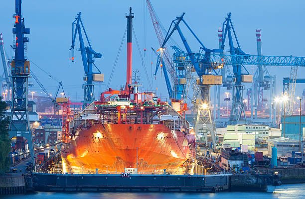 Ship Maintenance in Dry Dock at Night- Taske Marine